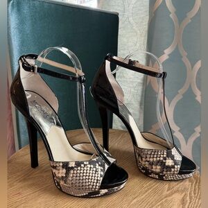 Micheal Kors snake print heels.